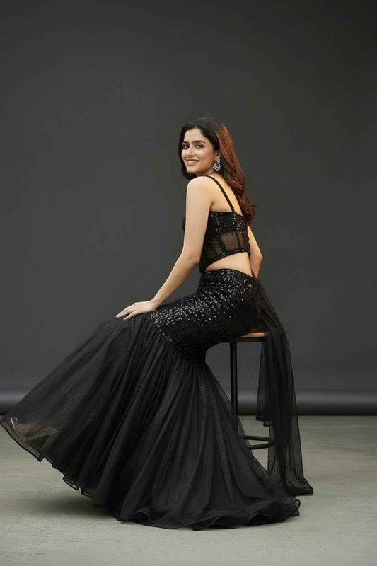 Black shimmer lehenga with corset blouse
