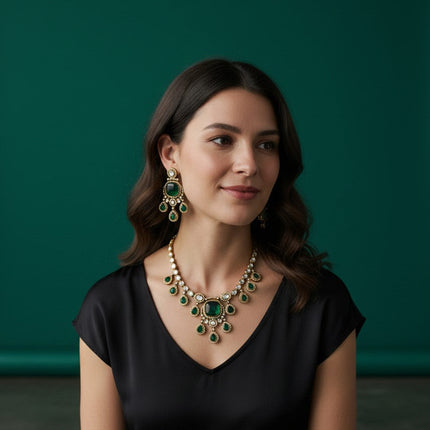 Kurti Connection USA emerald green doublet stone necklace and earring set worn by a woman in a black top