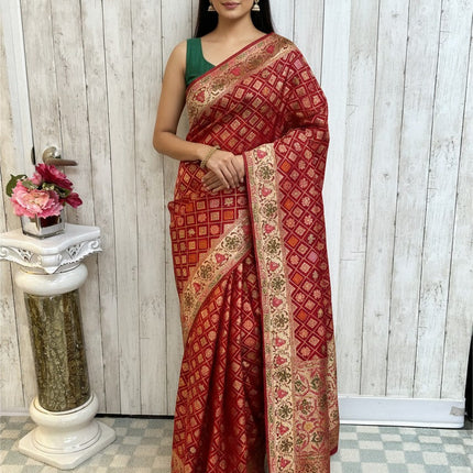 Kurti Connection USA red Bandhani patola saree with intricate gold zari border and geometric patterns