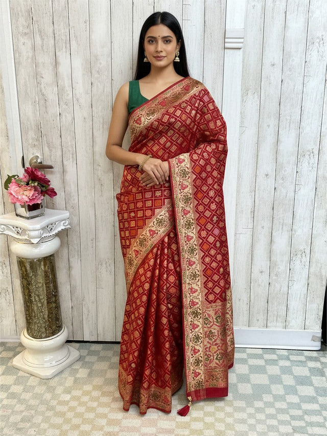 Kurti Connection USA red Bandhani patola saree with intricate gold zari border and geometric patterns
