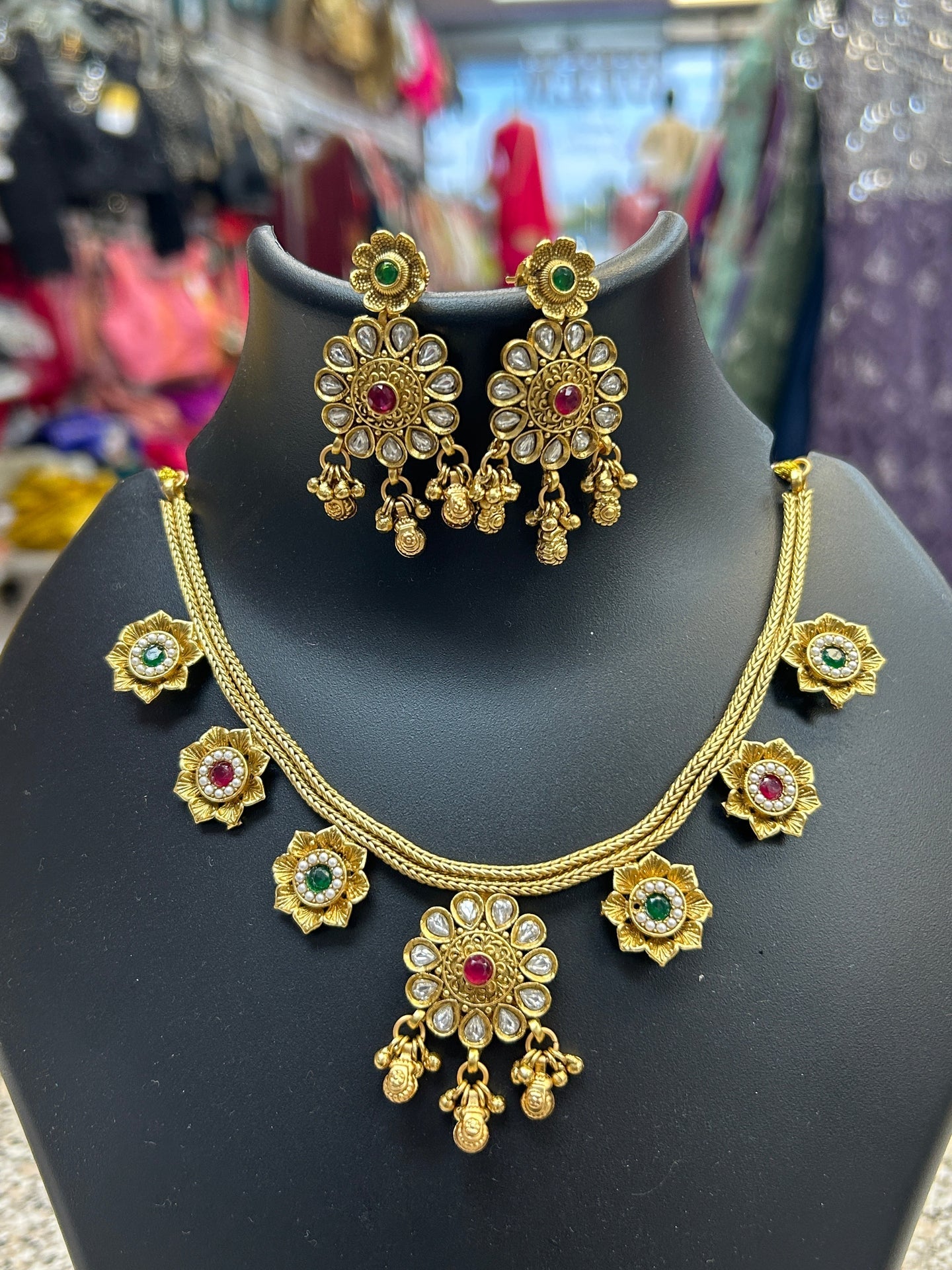 Gold polished necklace set by Kurti Connection USA