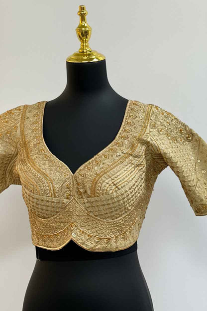 Gold blouse with heavy embroidery work