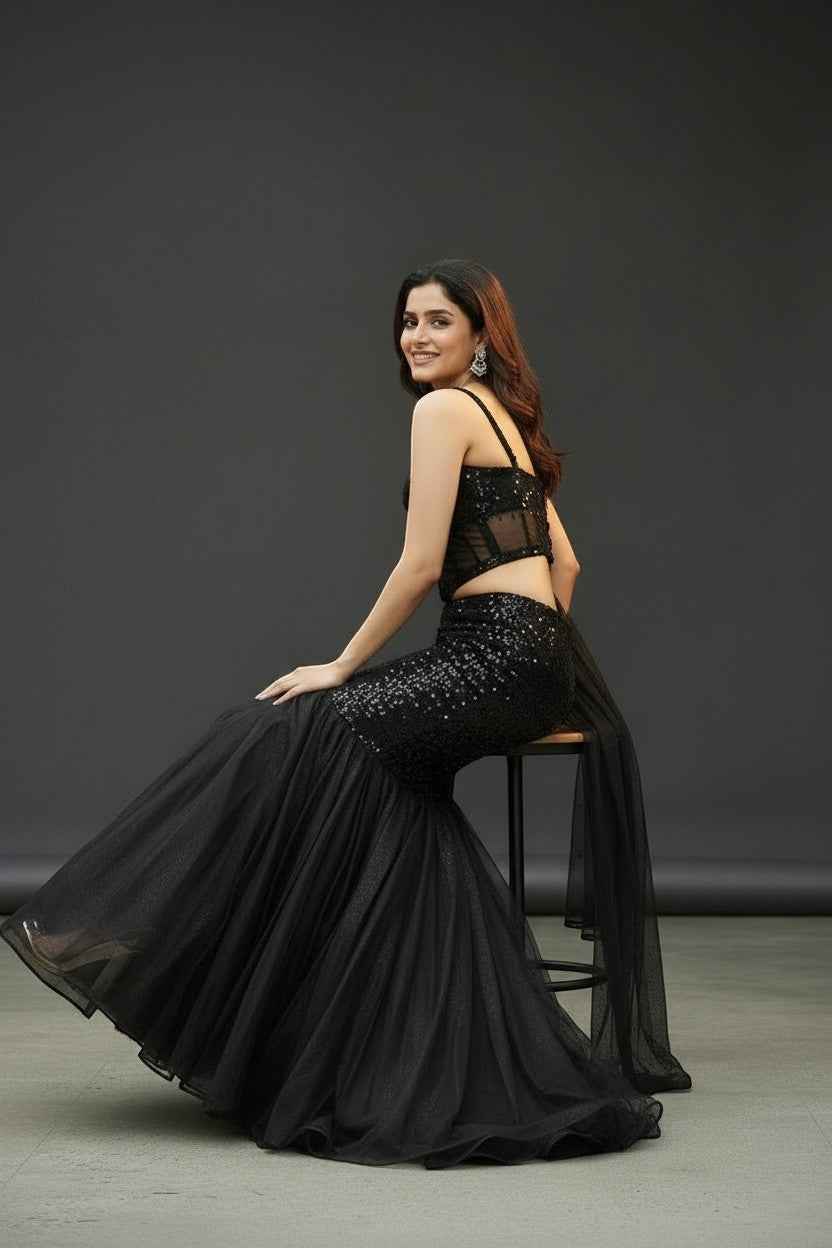 Black shimmer lehenga with corset blouse