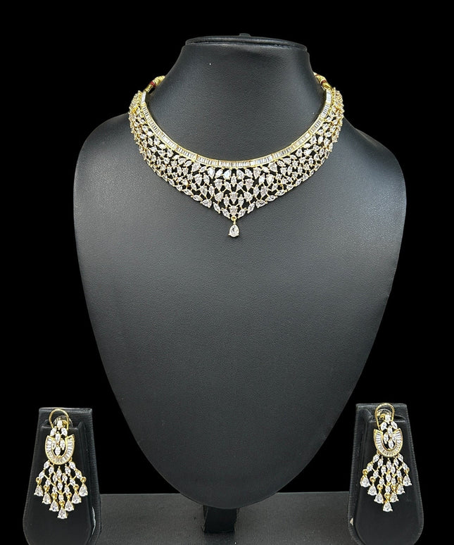 House Of Indian Wedding Attire gold-toned choker necklace with drop pendant and matching dangling earrings, adorned with clear cubic zirconia stones.