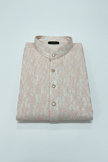 House Of Indian Wedding Attire light pink polyester kurta for men with intricate lace pattern and gold buttons.