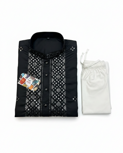 Kurti Connection USA black silk kurta with intricate mirror work embroidery paired with white pajama trousers