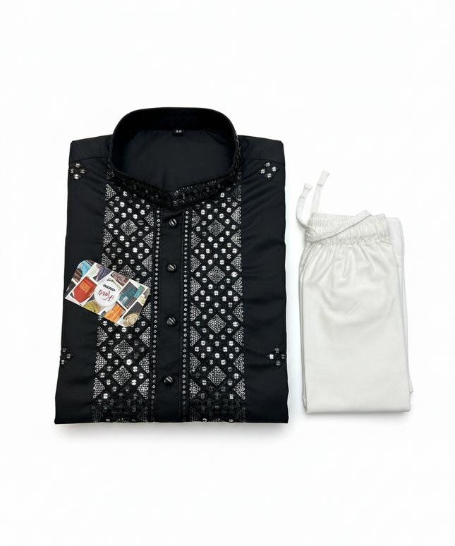 Kurti Connection USA black silk kurta with intricate mirror work embroidery paired with white pajama trousers