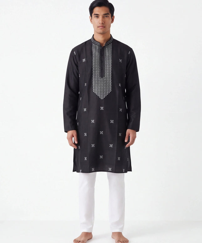 Kurti Connection USA black silk kurta with white geometric embroidery, mandarin collar, and white trousers on a model.