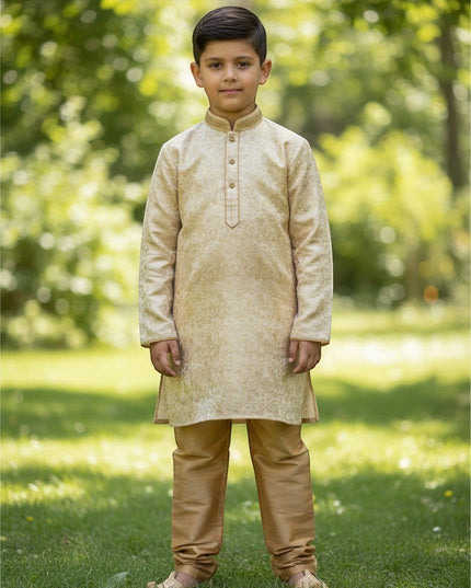 Kurti Connection USA boys cream jacquard kurti with embroidered mandarin collar and gold pajama pants in a garden