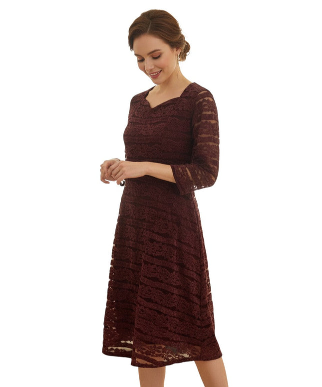 Kurti Connection USA burgundy velvet midi dress with lace overlay and three-quarter sleeves on a smiling model