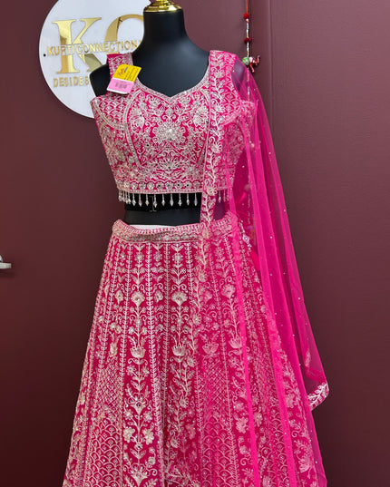 Kurti Connection USA dark pink lehenga choli set with intricate silver embroidery and matching sheer dupatta