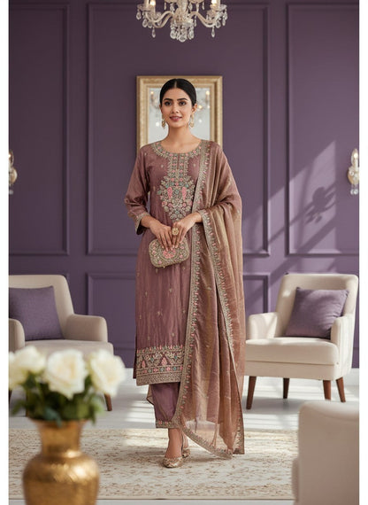 Kurti Connection USA dual tone tissue set with intricate embroidery on the neckline and hem. Includes matching dupatta and pants.