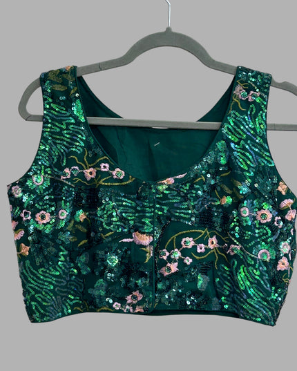 Kurti Connection USA emerald green sleeveless crop top with intricate floral embroidery and shimmering sequins
