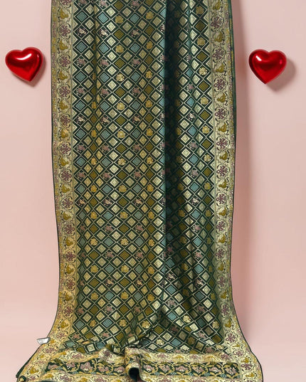Kurti Connection USA dark green Bandhani saree with gold zari diamond patterns and intricate floral border