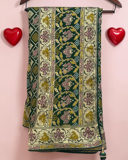 Kurti Connection USA green Bandhani saree with intricate gold and pink woven patterns, fall pico ready on a hanger
