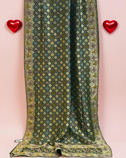 Kurti Connection USA dark green Bandhani saree with intricate gold diamond patterns and ornate floral borders