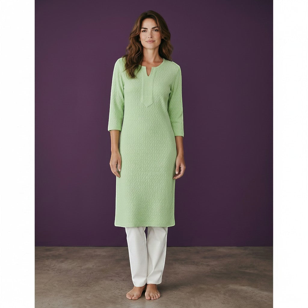 Kurti Connection USA light green textured cotton kurti with 3/4 sleeves and white trousers.