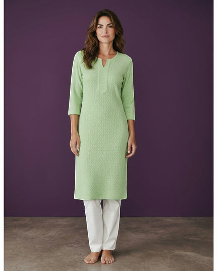 Kurti Connection USA light green textured cotton kurti with 3/4 sleeves and a notched neckline, paired with white trousers.