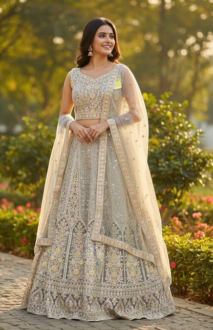 Kurti Connection USA grey embellished lehenga choli with dupatta, intricate embroidery and sparkling details, suitable for special occasions.