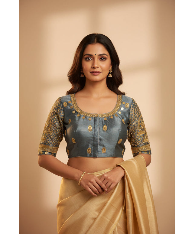 Kurti Connection USA grey silk blouse with intricate gold Maggam embroidery and traditional handcrafted details.