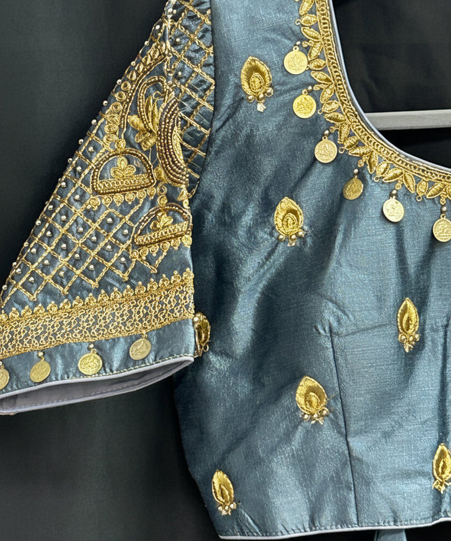 Kurti Connection USA grey silk blouse with intricate gold Maggam embroidery and coin detailing on sleeves and neckline