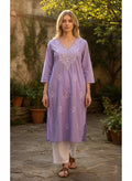 Kurti Connection USA lavender cotton tunic with white floral embroidery, V-neck, and three-quarter sleeves.