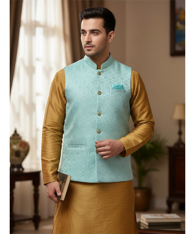 Kurti Connection USA light blue jacquard Nehru jacket with mandarin collar worn over a gold kurta for men.
