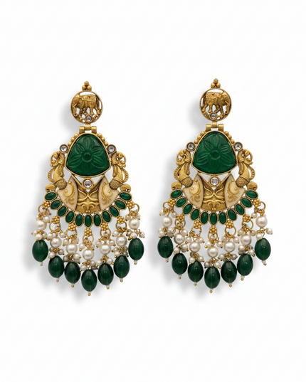 Kurti Connection USA long gold-tone jhumki earrings featuring green stones, elephant motifs, and hanging pearl beads.