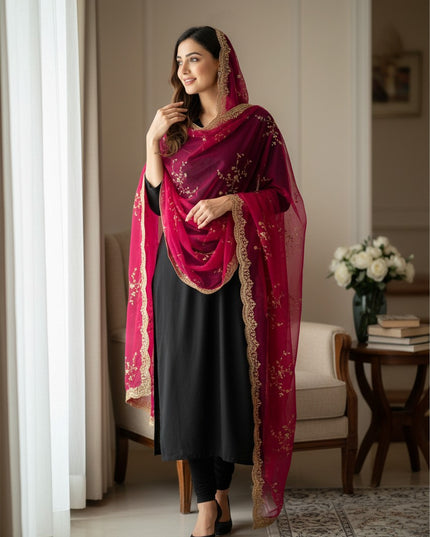 Kurti Connection USA tissue silk dupatta in deep magenta with intricate gold sequin embroidery draped over a black suit