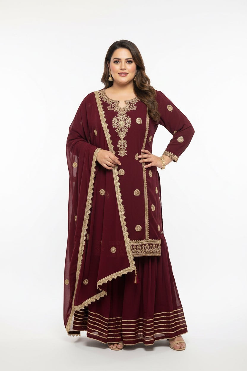 Kurti Connection USA plus size maroon kurti sharara set with gold embroidery and matching dupatta on a model
