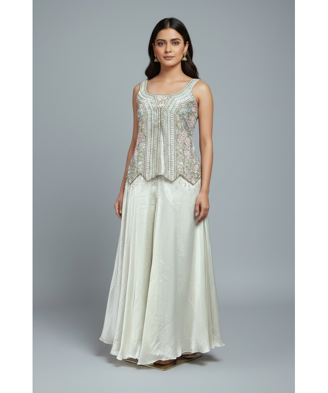 Kurti Connection USA off-white sharara set with sleeveless embroidered tunic, wide-leg trousers, and matching necklace