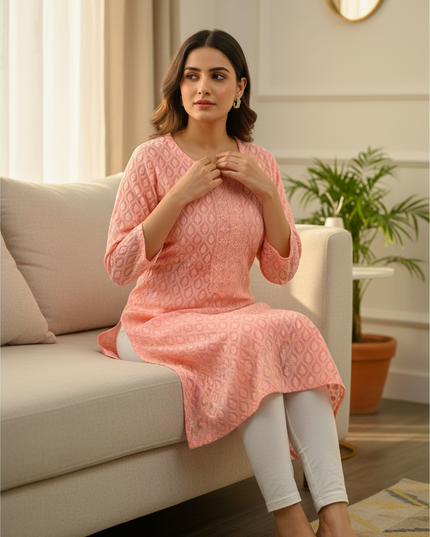 Kurti Connection USA peach embroidered kurti top with leaf patterns and textured front panel worn by a woman