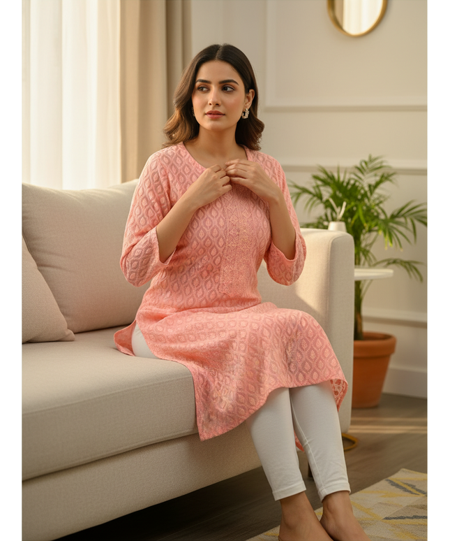 Kurti Connection USA peach embroidered kurti top with leaf patterns and textured front panel worn by a woman