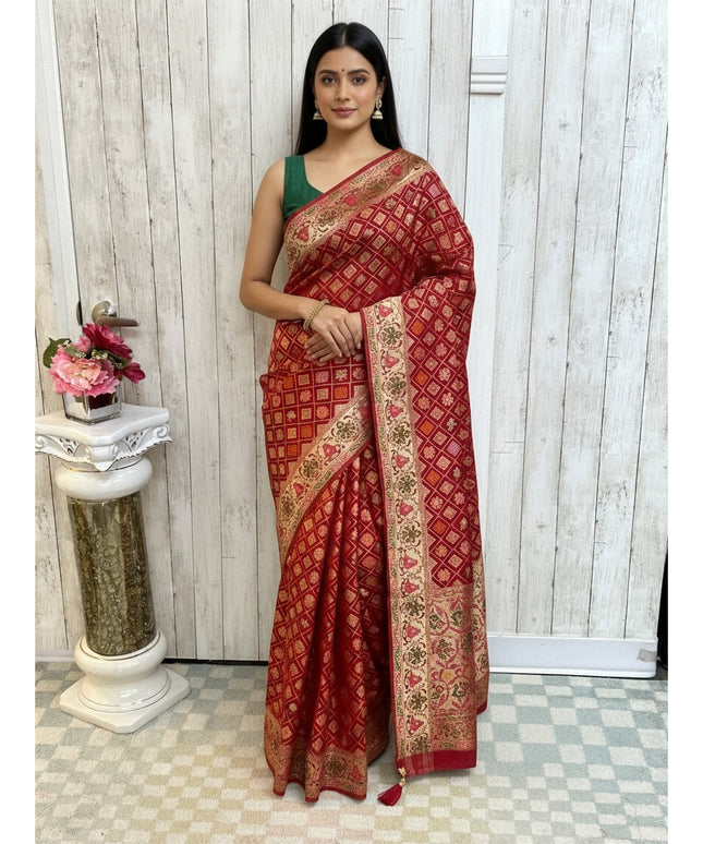 Kurti Connection USA red Bandhani patola saree with intricate gold zari border and geometric patterns