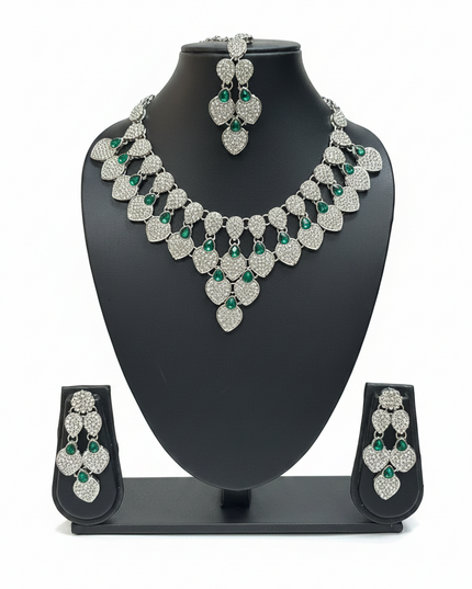 Kurti Connection USA silver-toned necklace set featuring teardrop-shaped crystals and green stone accents