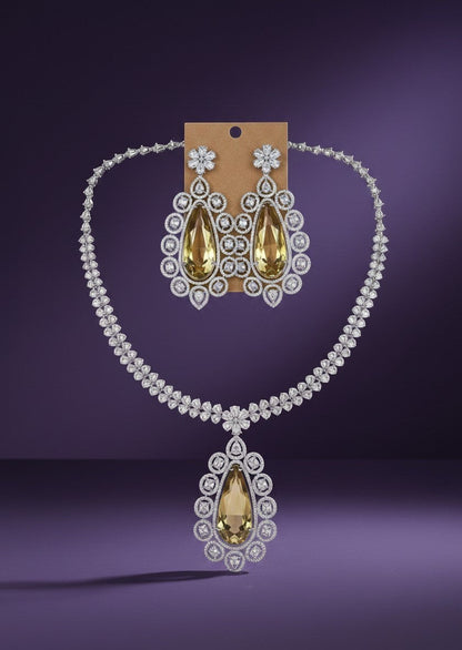 Kurti Connection USA statement necklace and earring set with pear-shaped yellow gemstones and cubic zirconia.