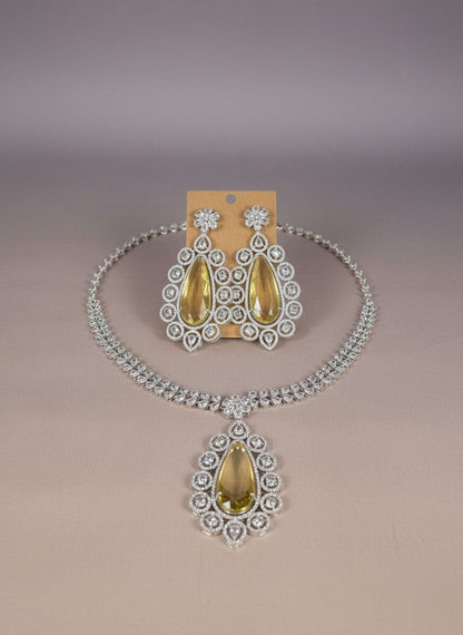 Kurti Connection USA statement necklace set with teardrop yellow stones and clear cubic zirconia in silver tone.