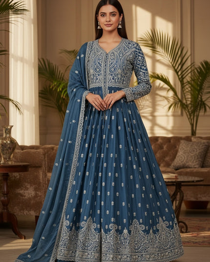 Kurti Connection USA teal blue anarkali kurti set with intricate silver embroidery, long sleeves, and matching dupatta.