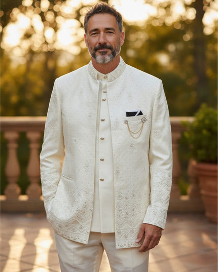 Man wearing a Kurti Connection USA white three-piece Indo-Western sherwani with intricate embroidery and double jacket